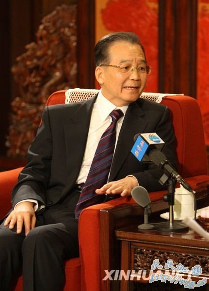 温家宝:中国应对金融危机的表现最终靠人民评价(图)