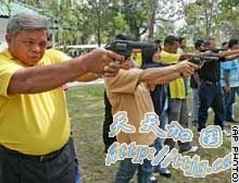 教师为泰国高风险职业 上课带枪以防袭击